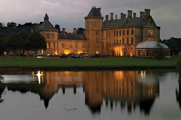 Mercure Warwickshire Walton Hall Hotel &amp; Spa across the lake reflecting